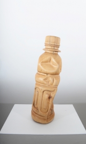 A water bottle, scaled up and hand carved out of wood.